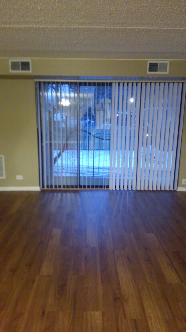 Living Room - New Flooring - 4702 N Austin Ave