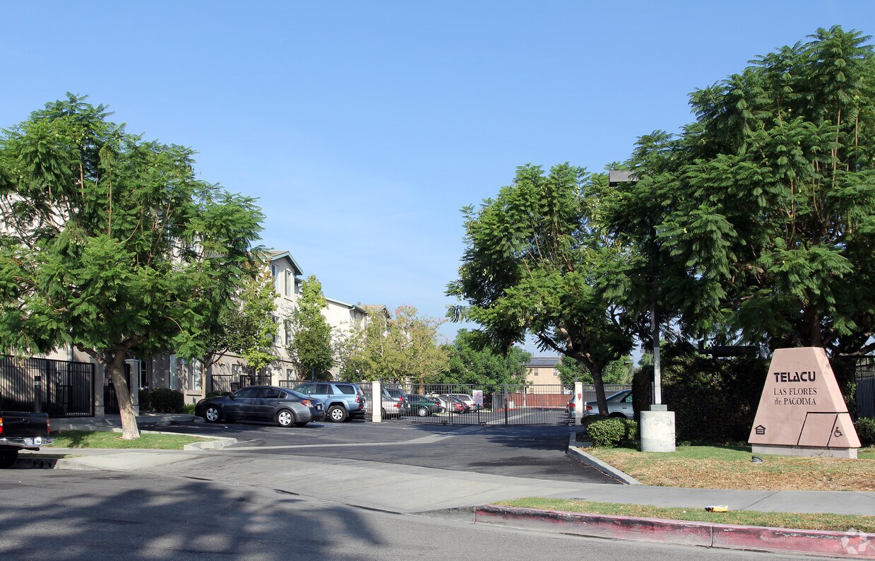 Building Photo - Telacu Las Flores Apartments