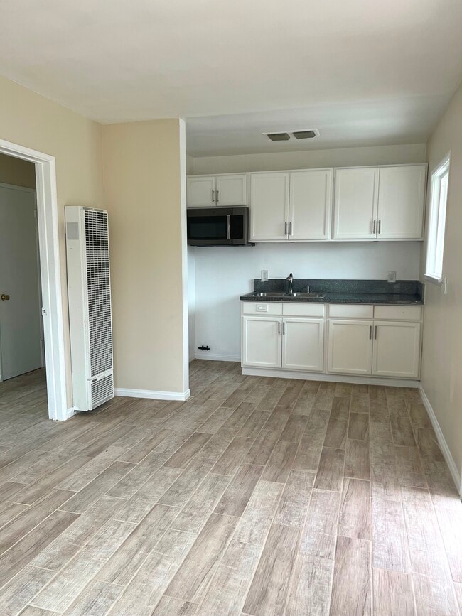 Living Room overlooking Kitchen - 721 E 42nd St