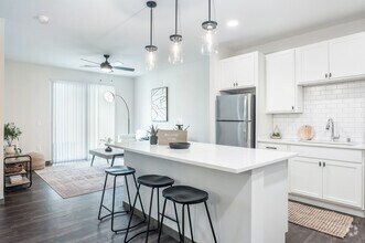 1BR, 1BA - 784SF - Kitchen, Living Room - Residences at DeForest Yards