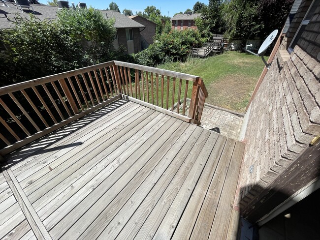 Deck garden and part of lawn area. - 466 E 400 S