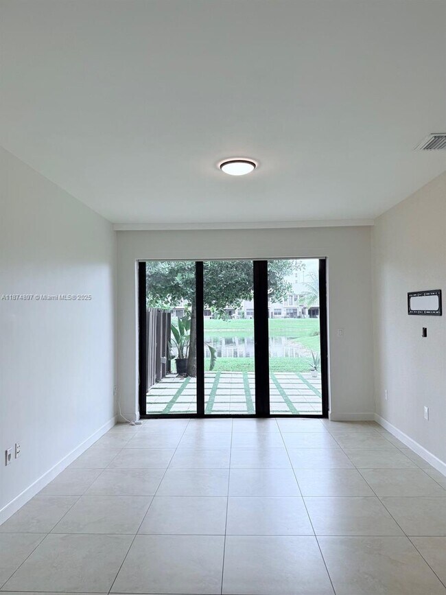 Building Photo - 5980 NW 104th Ct