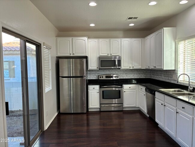 Building Photo - 14240 W Country Gables Dr