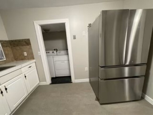 Kitchen/laundry room - 2221 E Arbor Ln