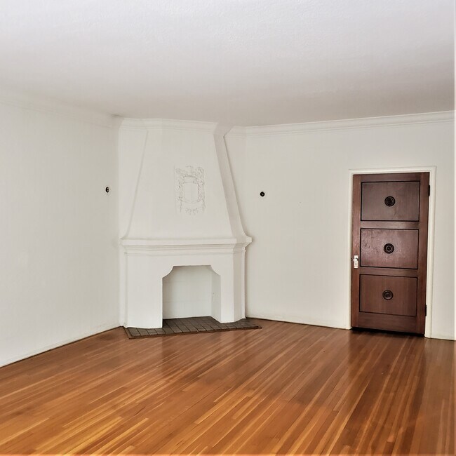decorative fireplace in living room - 1235 N Sweetzer Ave