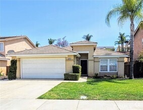 Building Photo - 8819 Dahlia Dr