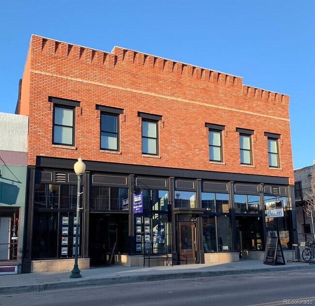 Unit occupies 1st 3 windows to the left - 139 W 1st St