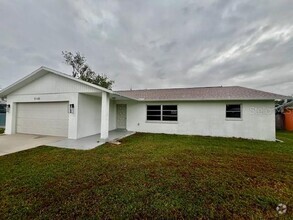 Building Photo - 3125 Port Charlotte Blvd