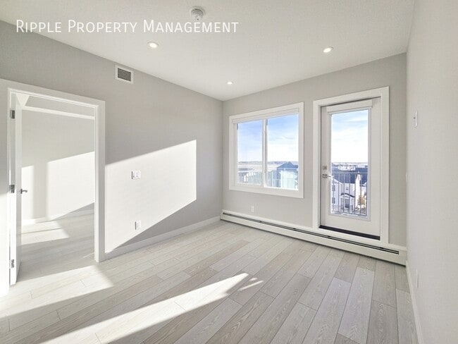 Building Photo - BRAND NEW 2 BEDS + DEN, 2 BATHS CONDO | ARTHUR IN SKYVIEW RANCH