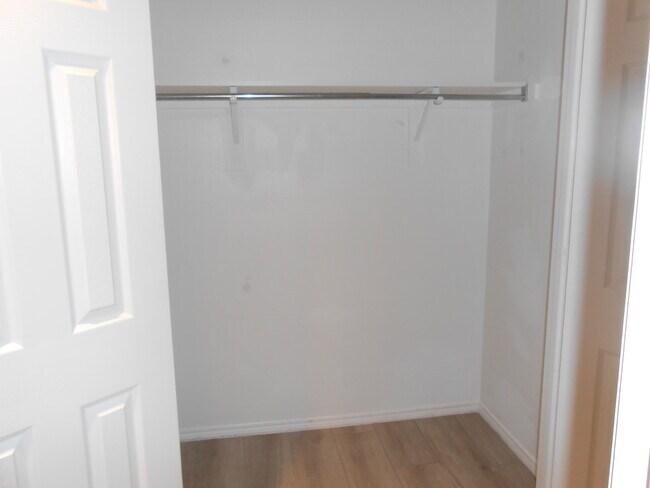 Hallway closet to the Bedrooms. - 6928 Prairie Dawn Ln