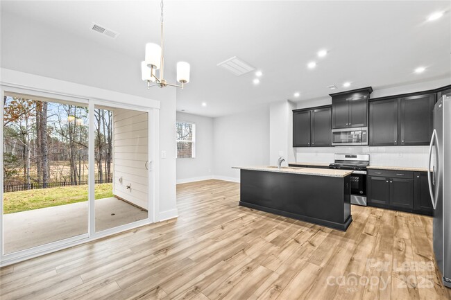 Building Photo - 9646 Munsing Dr