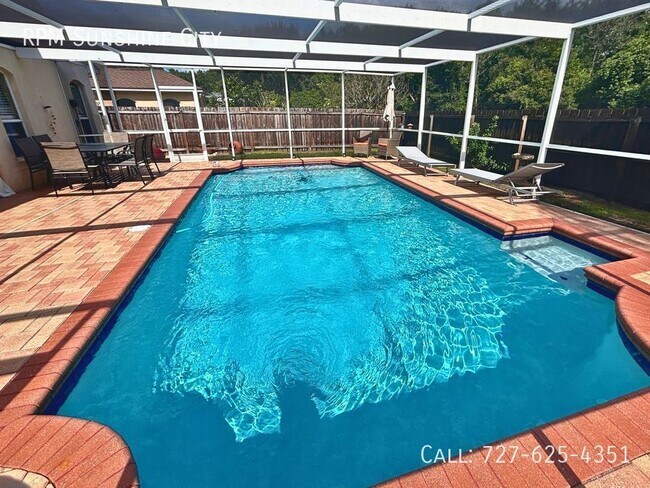 Building Photo - Luxury Pool Home: Your Dream Oasis Awaits!