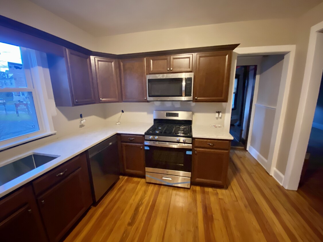 Kitchen, brand new oven and microwave, gas stove - 209 N Brandywine Ave