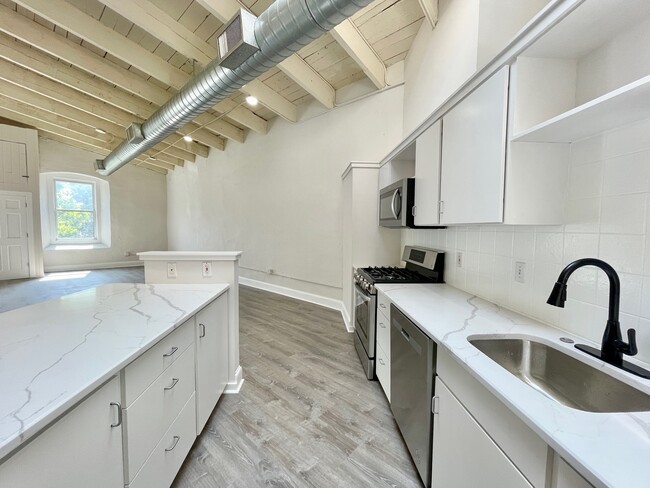 Upgraded Quartz Countertops - Lofts at Sherman Mills