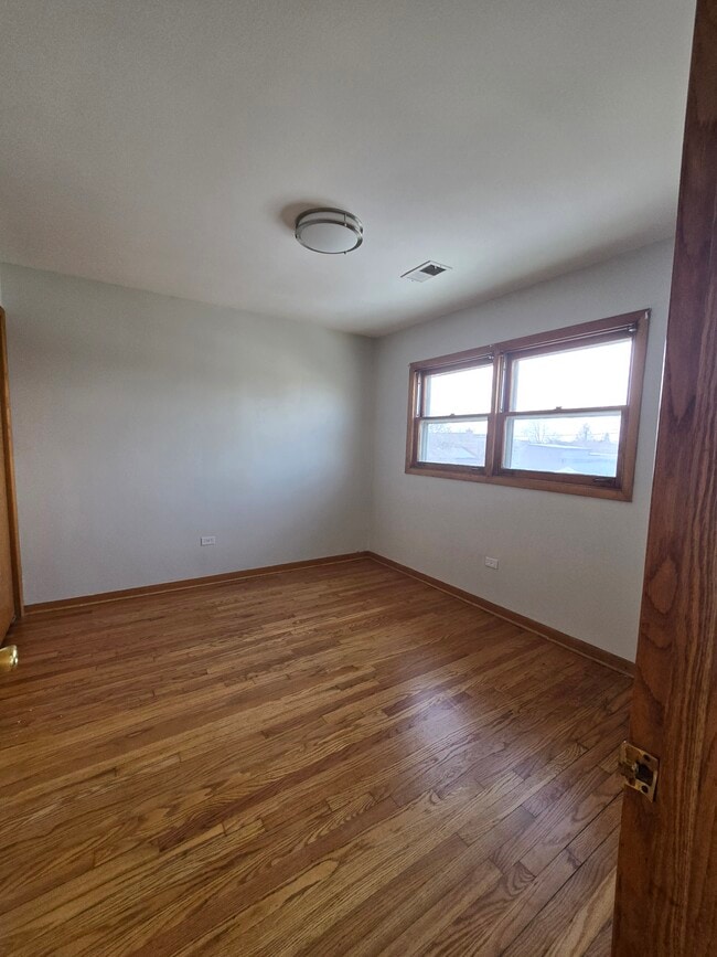 Building Photo - 6042 S Kolmar Ave