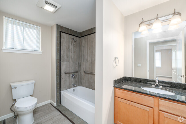 2BR, 1.5BA - 1,296SF - Primary Bathroom - Butternut Commons Luxury Apartments