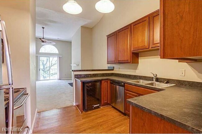 kitchen + open concept living/dining rooms - 201 Westover Ave
