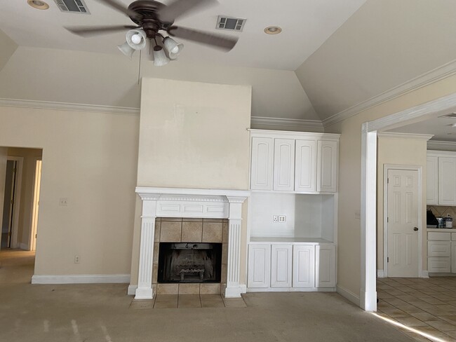 Living room with fireplace and computer nook - 308 Thatcher Ln