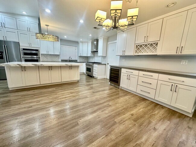 Building Photo - One story gorgeous home in the highly desi...