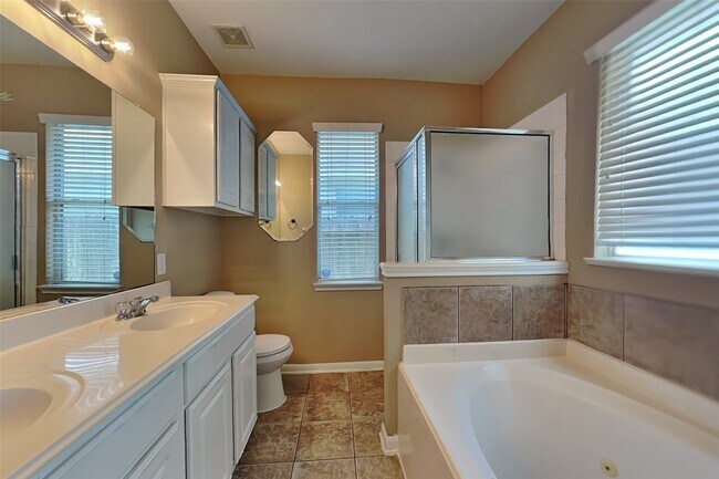 Building Photo - 7418 Jacobs Well Dr