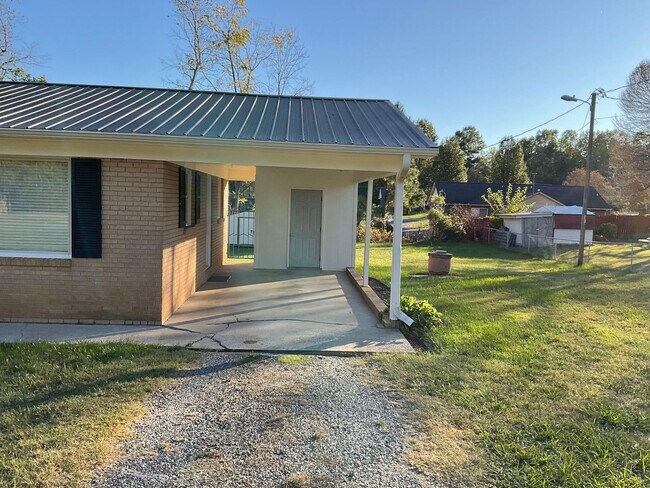 Building Photo - Home For Rent with Carport