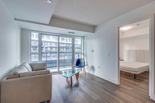 Building Photo - One Plus Den Furnished unit