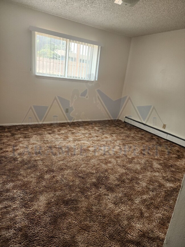 Foto del edificio - Cozy 1-Bedroom Apartment in Laramie, WY