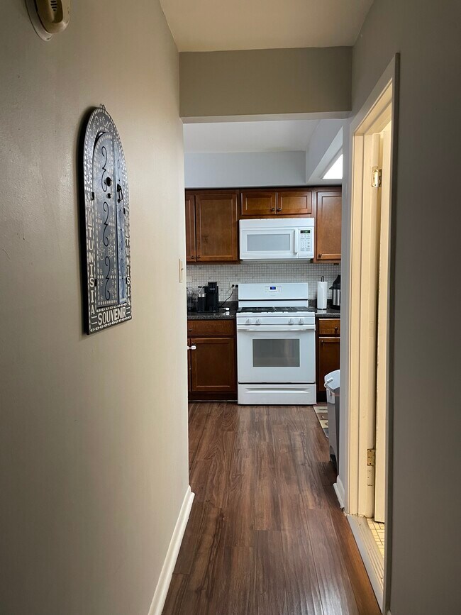 Hallway to Kitchen - 9405 S 79th Ct