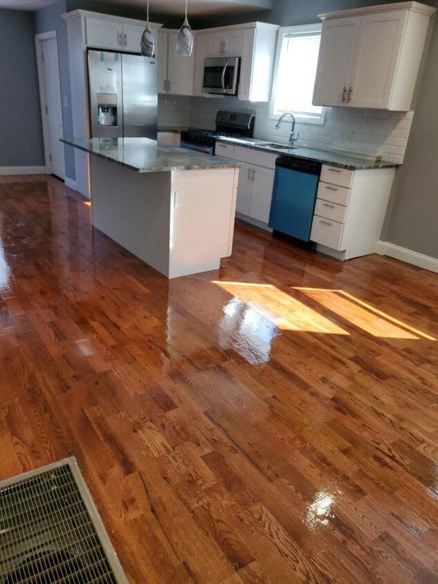 Kitchen w/ Island - 713 N Montello St
