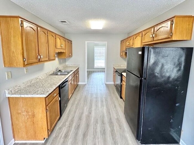 Building Photo - Now Leasing a 4-Bedroom 3 Bath With Bonus ...