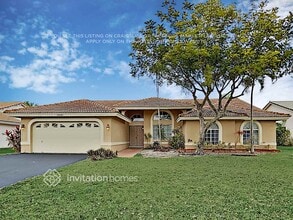 Building Photo - 10347 NW 50th Ct