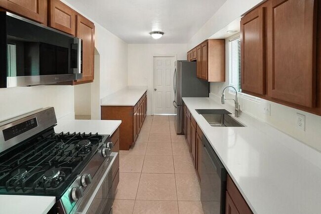 Building Photo - Beautifully remodeled through out with bright spacious open feeling!