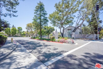 Building Photo - 12203 Santa Gertrudes Ave