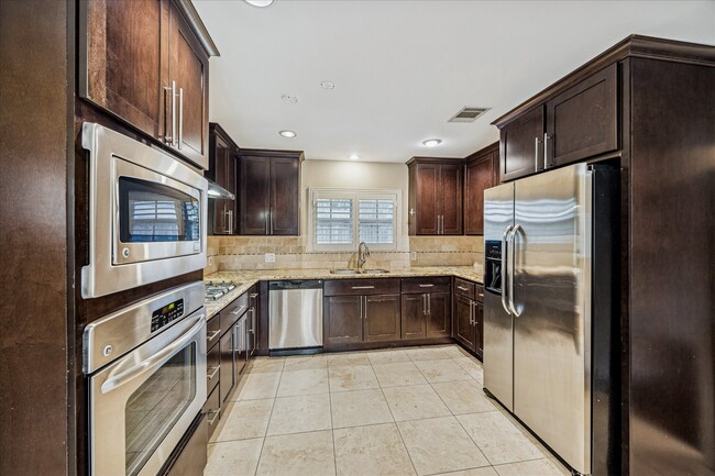 Foto del edificio - 9106 Riddlewood Ln