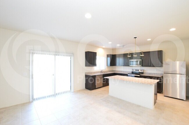 Building Photo - 24588 W Flores Dr