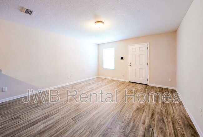 Building Photo - 8511 McGirts Village Ln