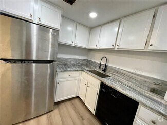 Building Photo - 3680 Inverrary Dr