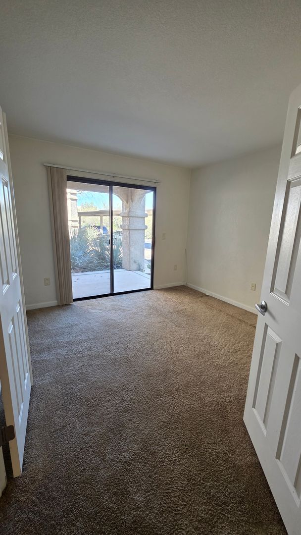 Building Photo - Take in mountain and desert views! First-level, two-bedroom, two-bath corner unit in Moonrise at ...