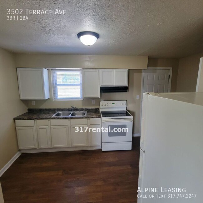 Building Photo - New Rehab Great location! Attached garage/...