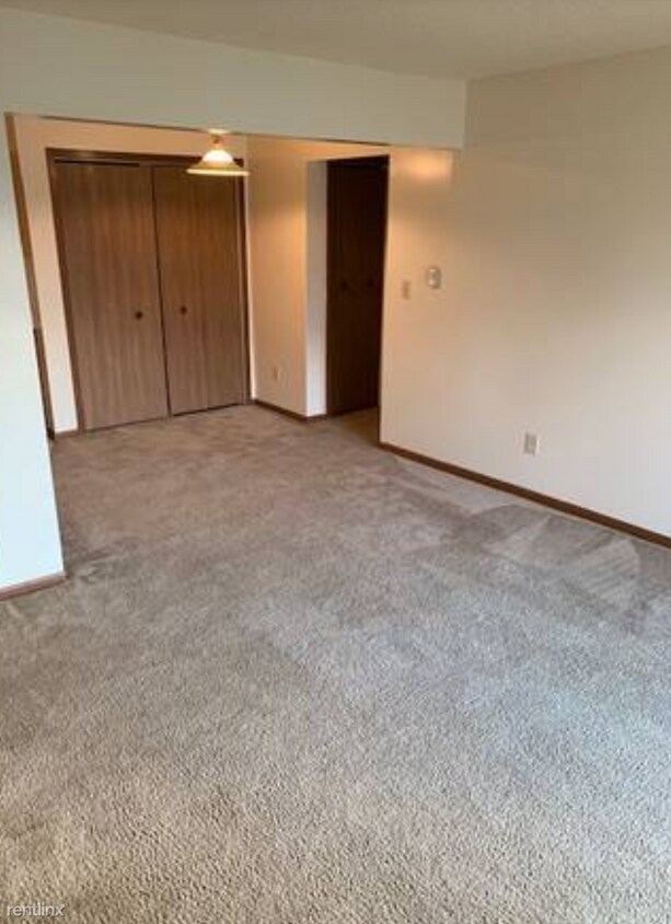 Building Photo - 1 br, 1 bath Apartment - Sunrise Apartments