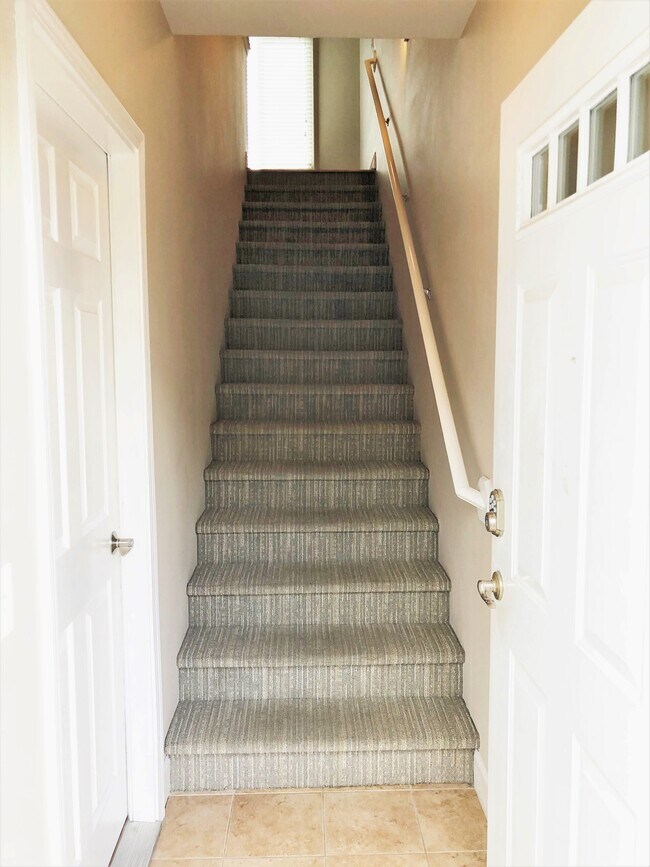 Stairs to First Floor - 206 E 56th Ave