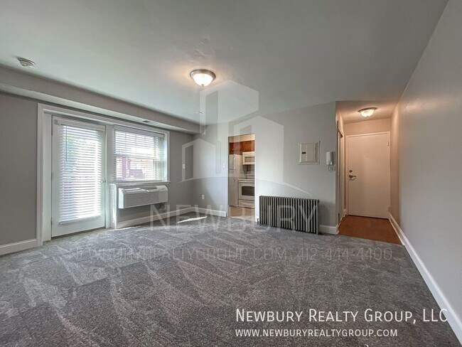 Building Photo - Charming, Bright, and Ready for YOU!