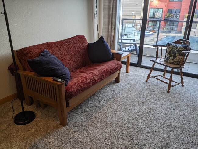 Futon in great room - 1040 NW Naito Pky