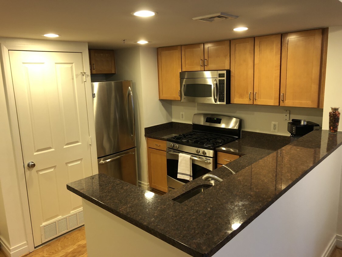 Kitchen View 2 / Closet encloses Washer Dryer - 414 Water St