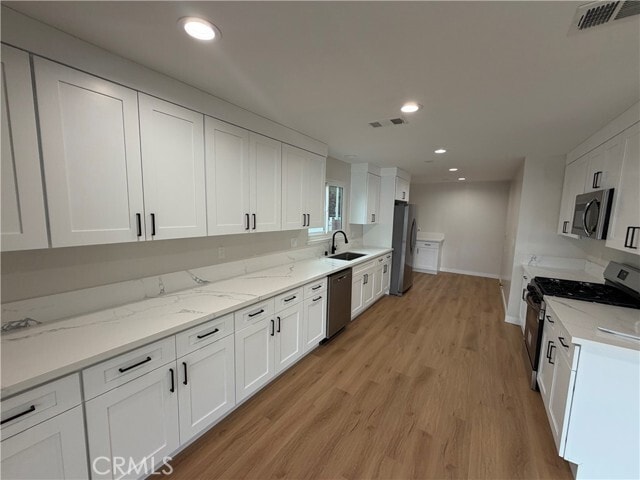 Building Photo - 6934 Woodlake Ave