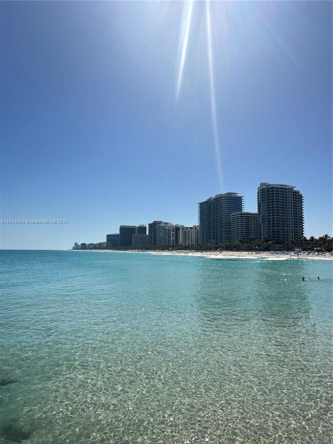 Building Photo - 10275 Collins Ave