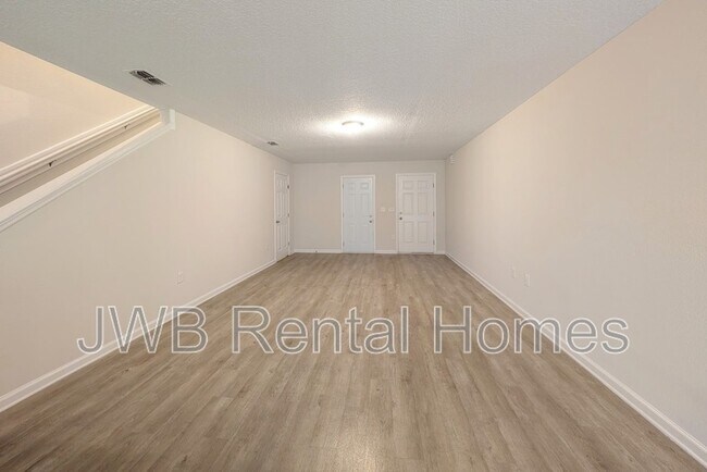 Building Photo - 7808 Playschool Ln