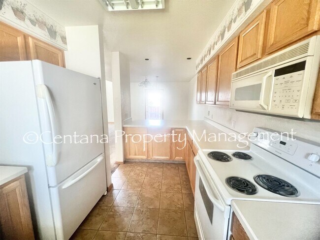 Building Photo - 3 bedroom Condo with a garage and 2 1/2 ba...