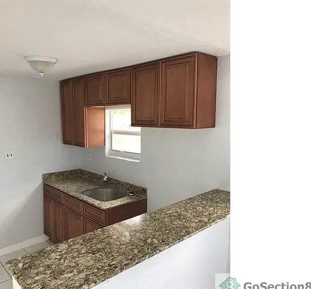 Building Photo - 222 NE 13th Ave