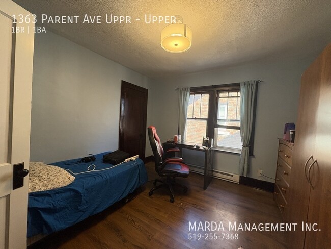 Building Photo - SPACIOUS 1-BEDROOM + OFFICE/1-BATH UPPER U...